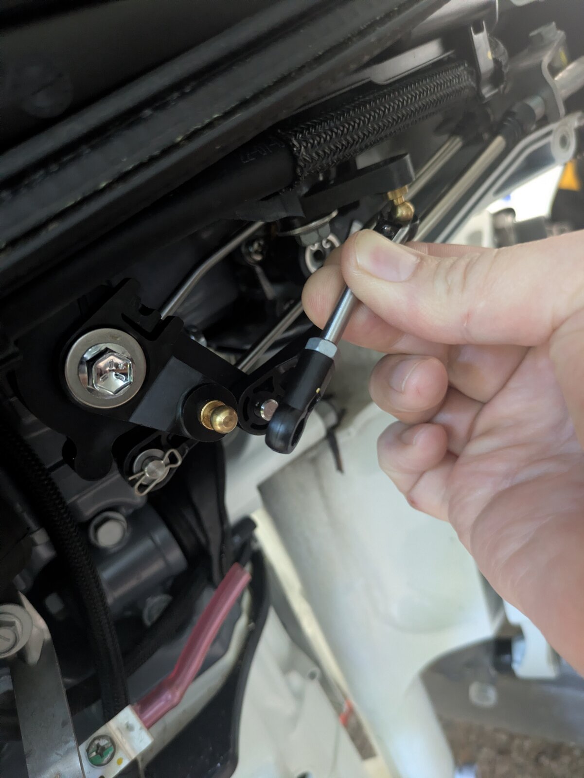 Disconnecting the aft end of the throttle pushrod
