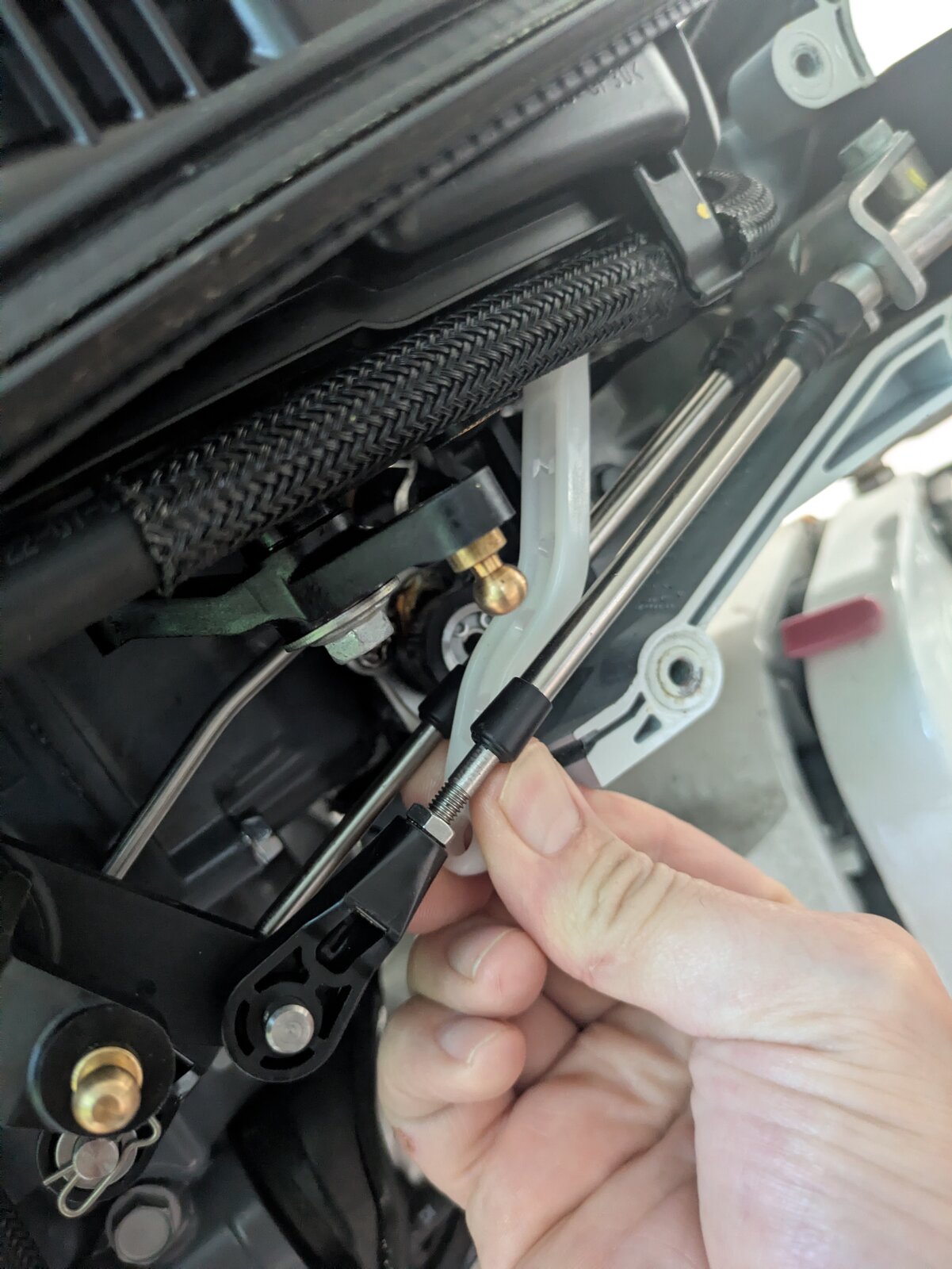 Removing the stock white plastic throttle arm