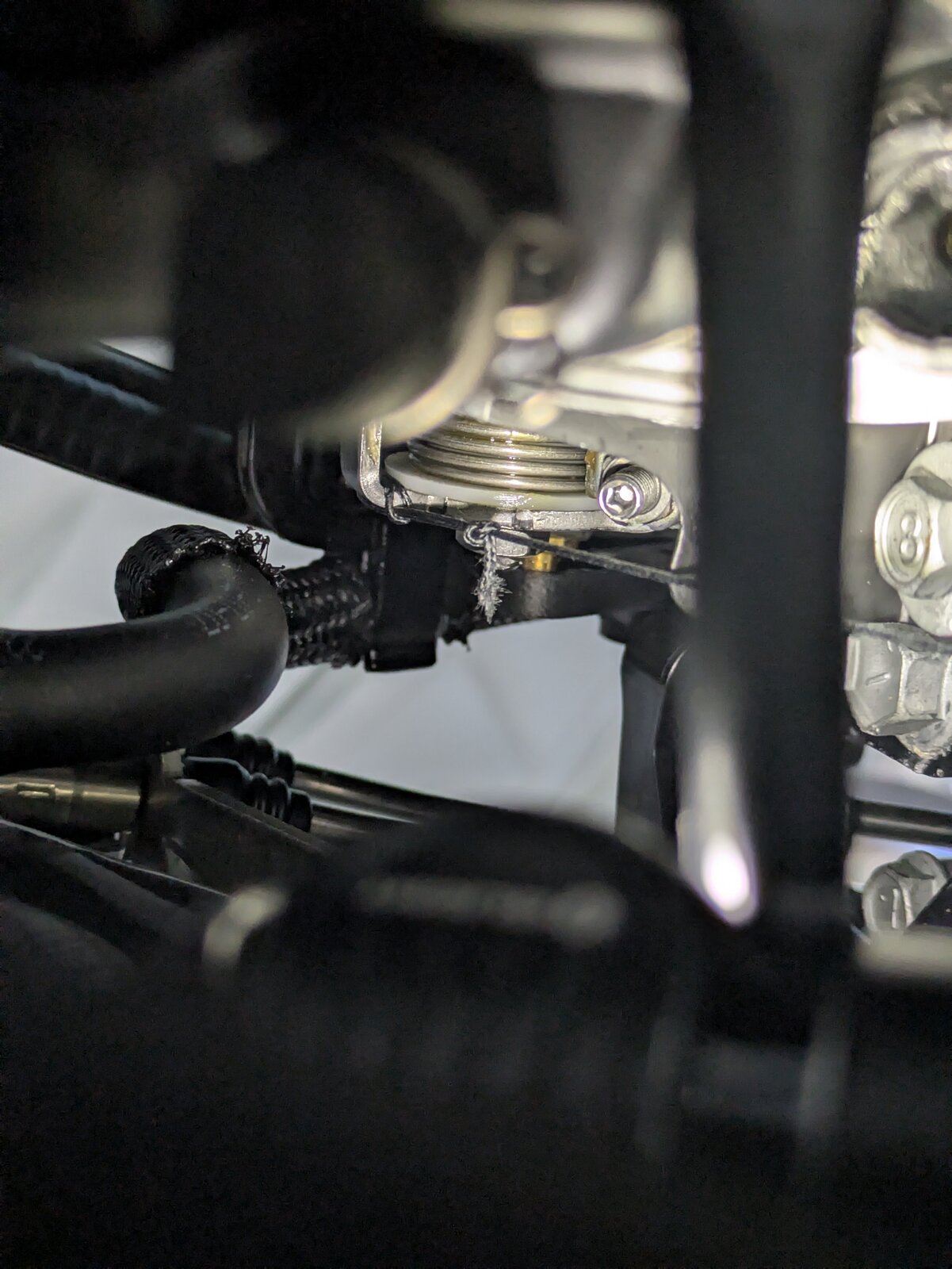 Cinch the loop knot tightly around the tab