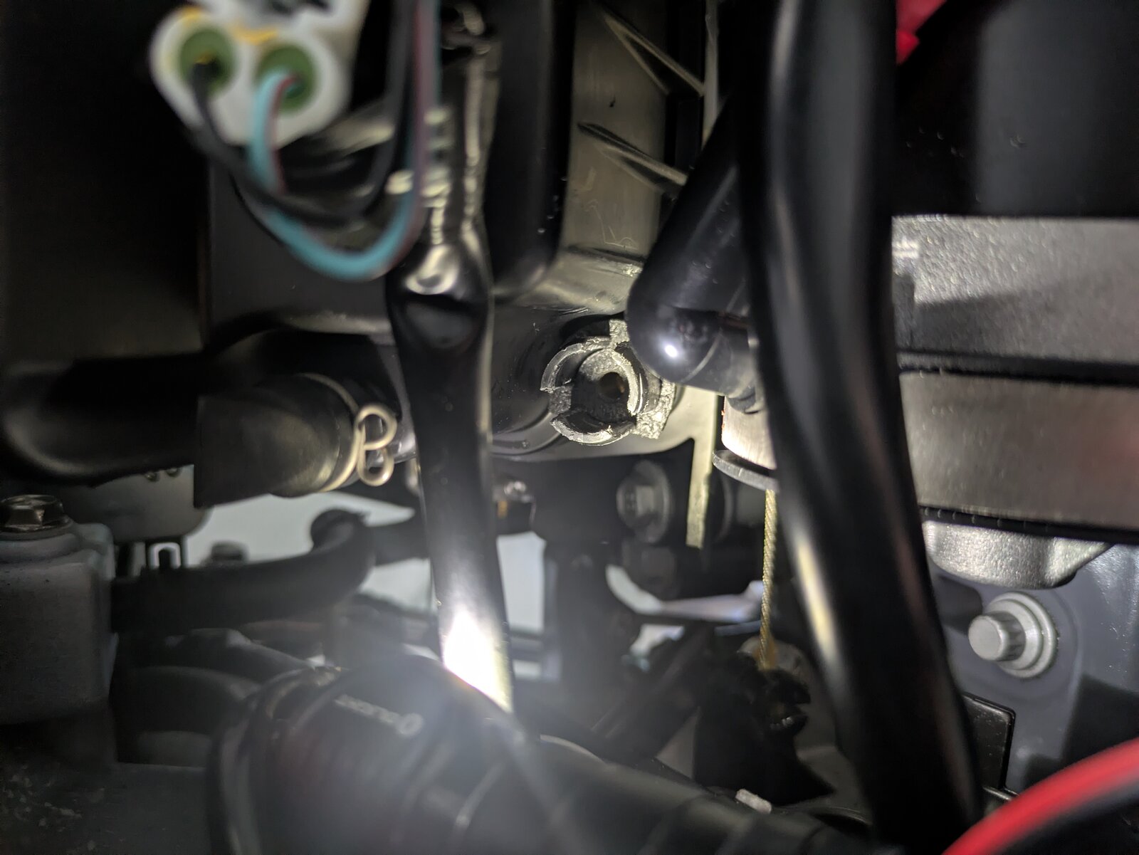 Removing the original screw for the guide bracket