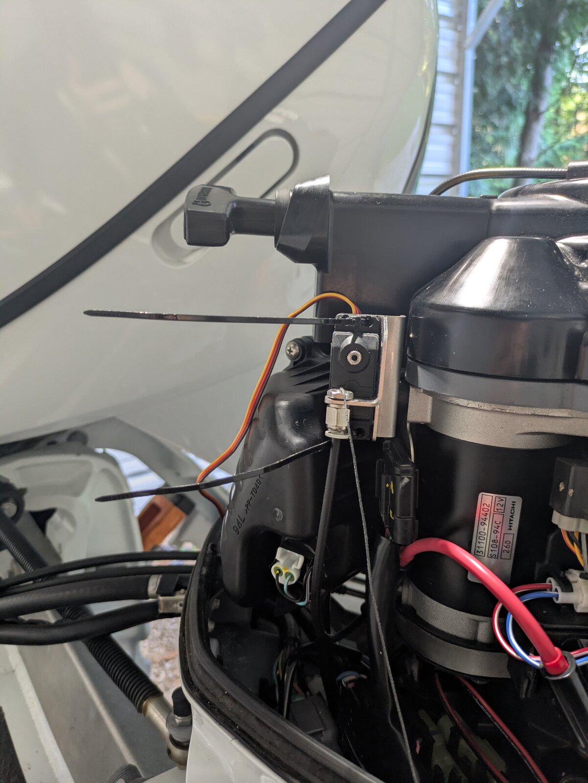 Servo fully mounted and secured with zip ties